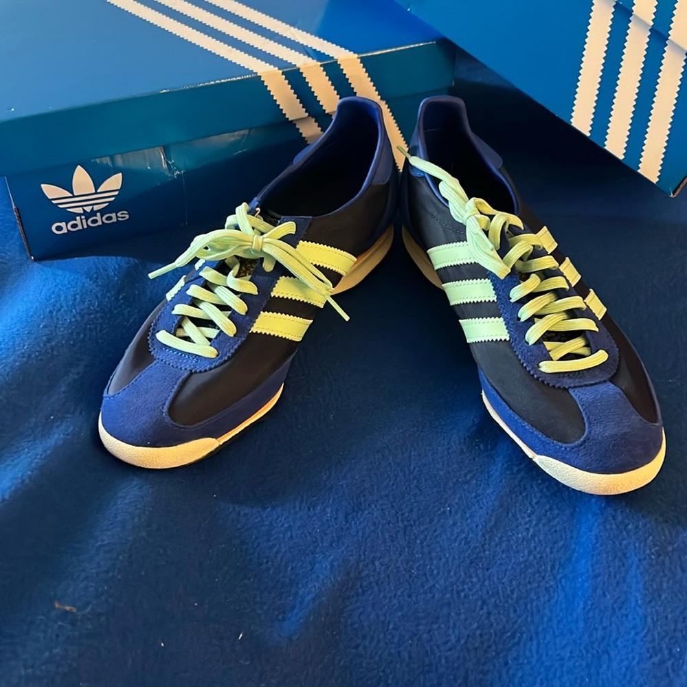 Adidas SL OG Women’s 8.5 Blue with mint green stripes.  Worn once. Look new
